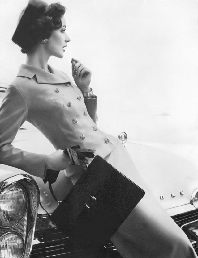 #12 Betsy Pickering in brown wool-Orlon suit by Handmacher, 1957