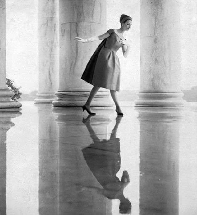 #16 Betsy Pickering in emerald silk dress with floating back panel by Helga, 1958