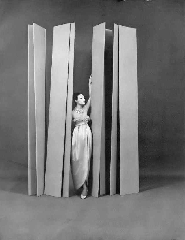 #17 Betsy Pickering in golden satin evening gown by Lanvin-Castillo, 1958