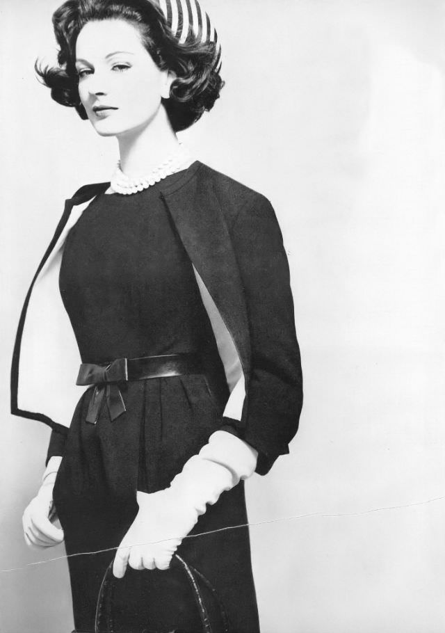 #20 Betsy Pickering in black crêpe cardigan suit by Ben Zuckerman, 1959