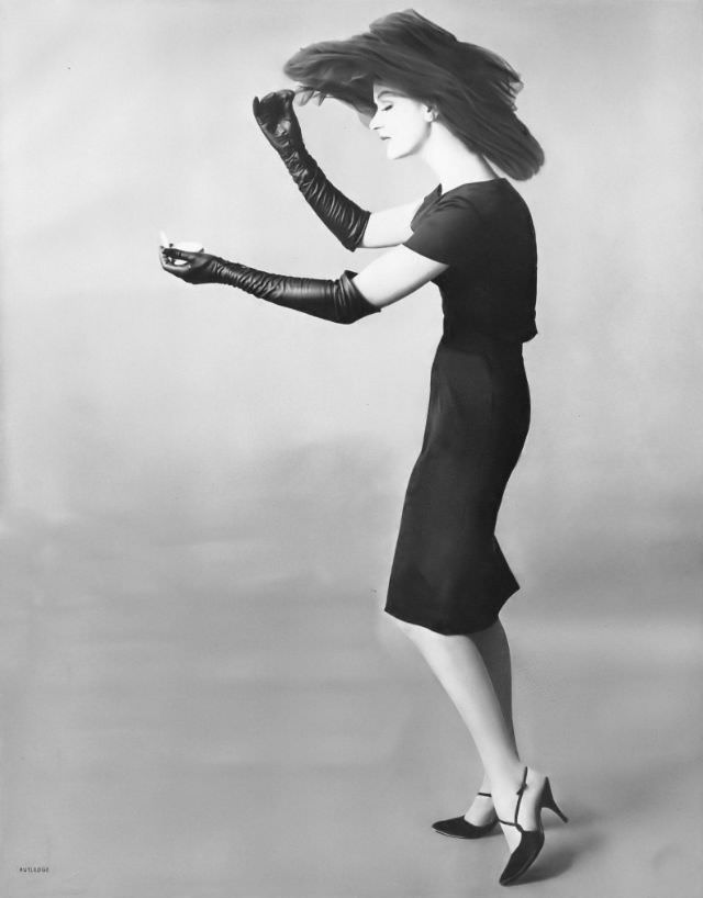 #22 Betsy Pickering in black silk crêpe dress by A. Goodman, 1959