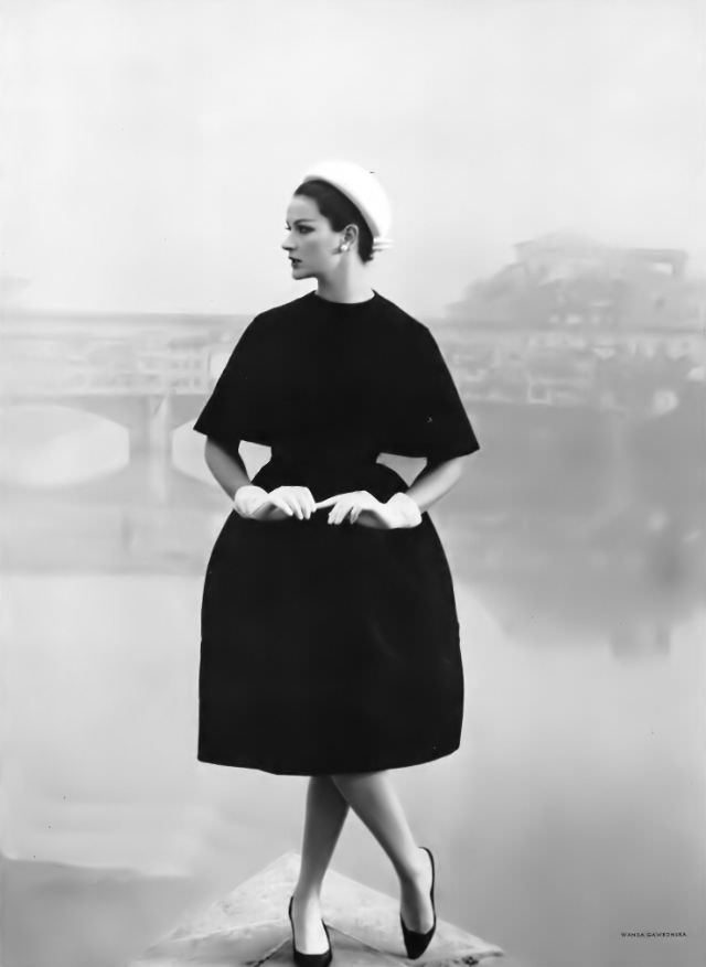 #23 Betsy Pickering in black wool egg-shaped dress by Simonetta, 1959