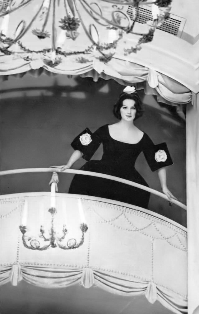#34 Betsy Pickering in short black faille evening dress by Patrick de Barentzen, 1959