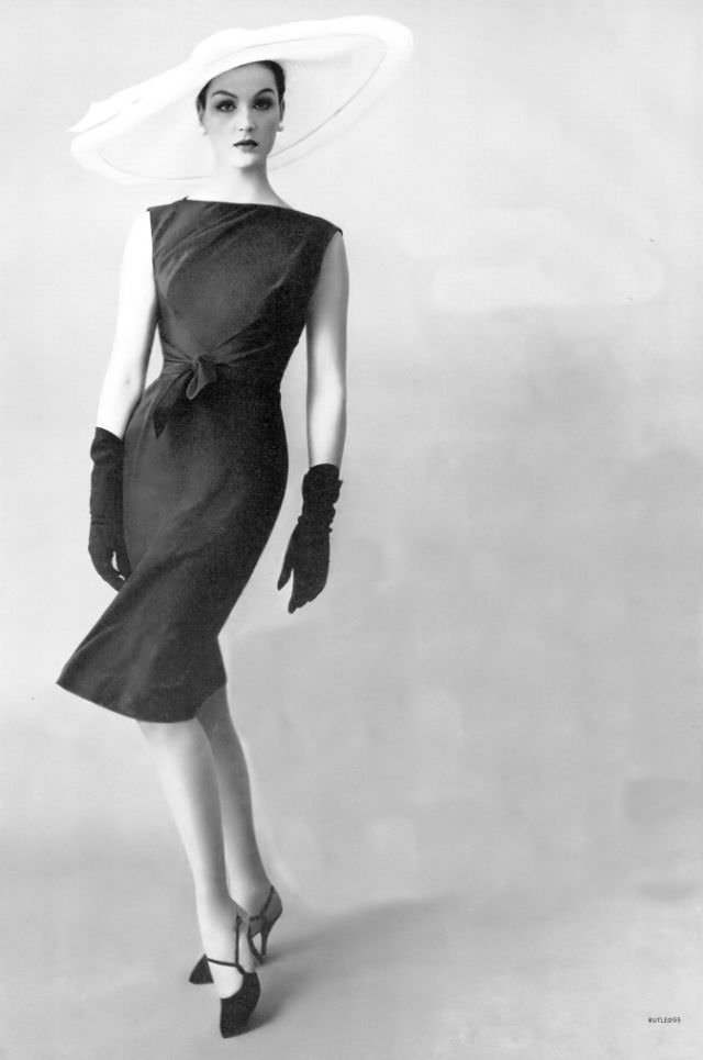#36 Betsy Pickering in black silk crêpe dress by Miss Bergdorf, 1959