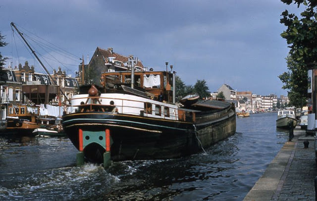 #114 Boat on canal, Amsterdam, Netherlands, 1961