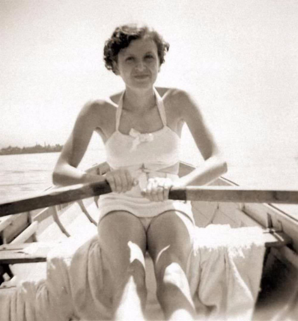 #10 Eva Braun in a rowboat on Lake Worthsee near Munich in 1937.