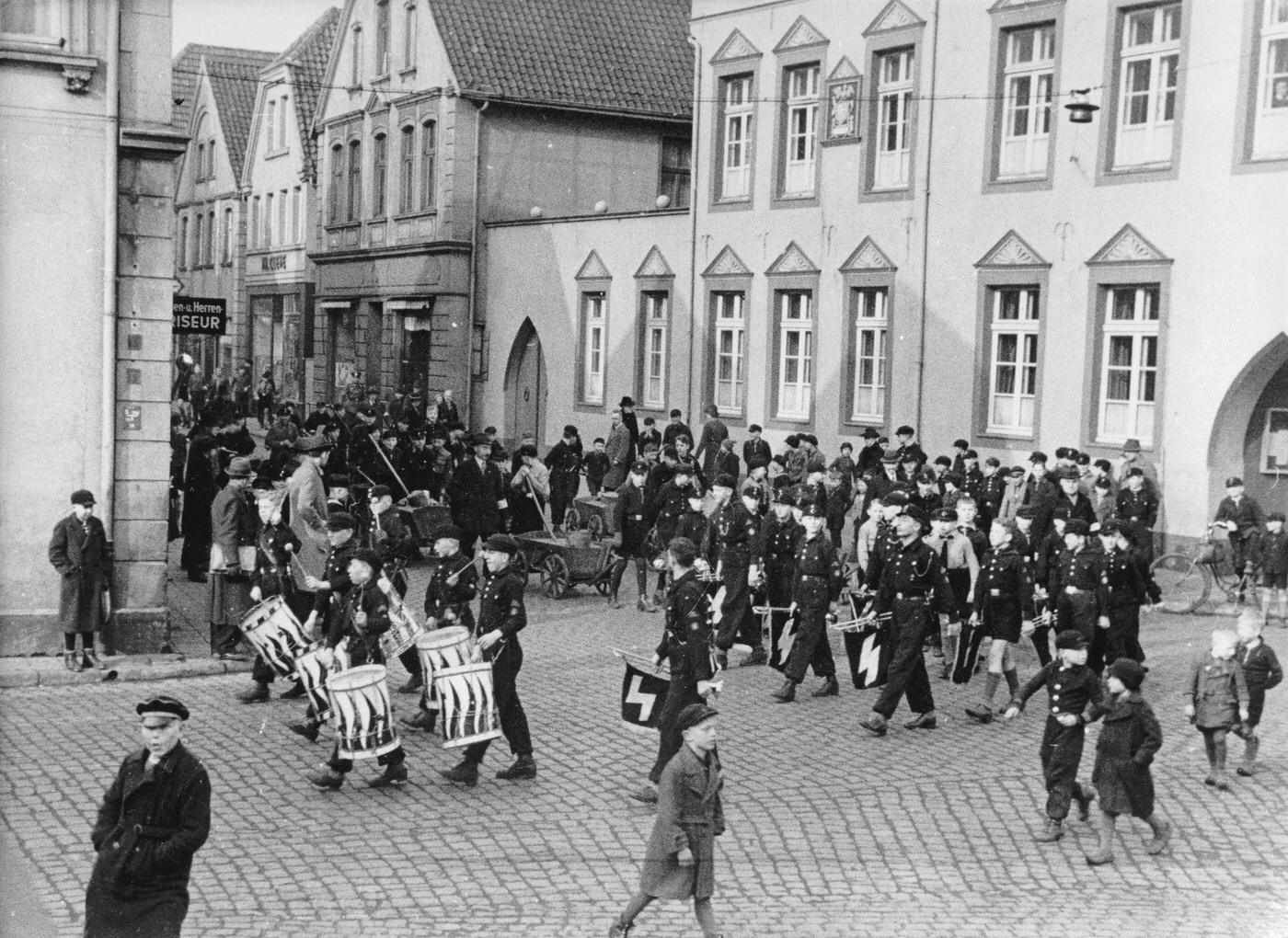 #110 Little Berliners eating porridge made of flour and milk during recess, Berlin, Germany, circa 1940, 1940.