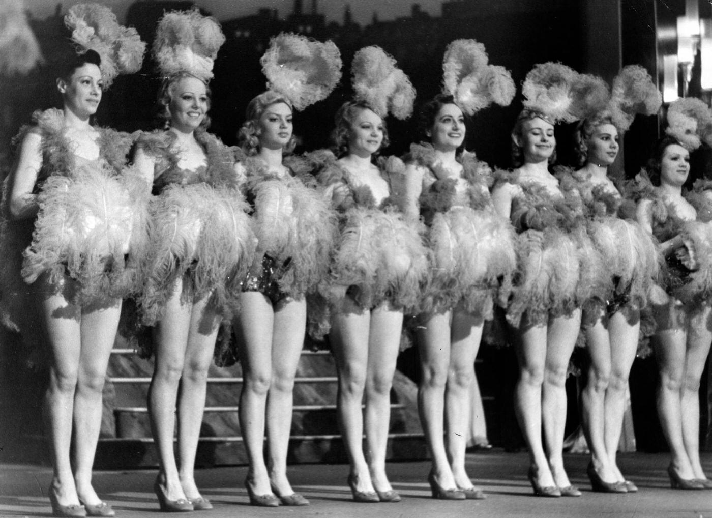 #89 NSV Nurses With Babies: Nurses with babies under a sunlamp at the NSV, the welfare organization of the Nazi party during World War II, 1939-1945.