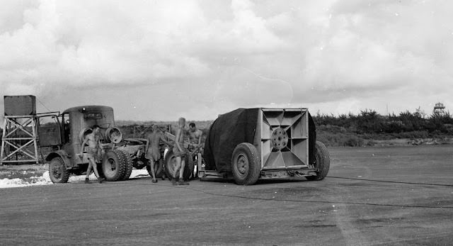 #22 Fat Man is manually pushed to the bomb pit.
