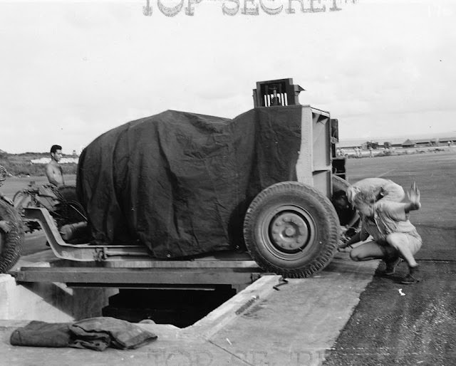 #23 Fat Man’s alignment with the bomb pit is checked.