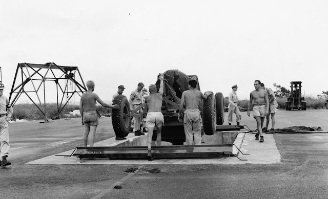 #26 Once alignment is complete, Fat Man is lowered into the pit.