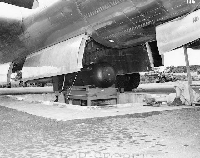 #5 Little Boy is lifted via a hydraulic lift into the Enola Gay Little Boy is lifted via a hydraulic lift into the Enola Gay.