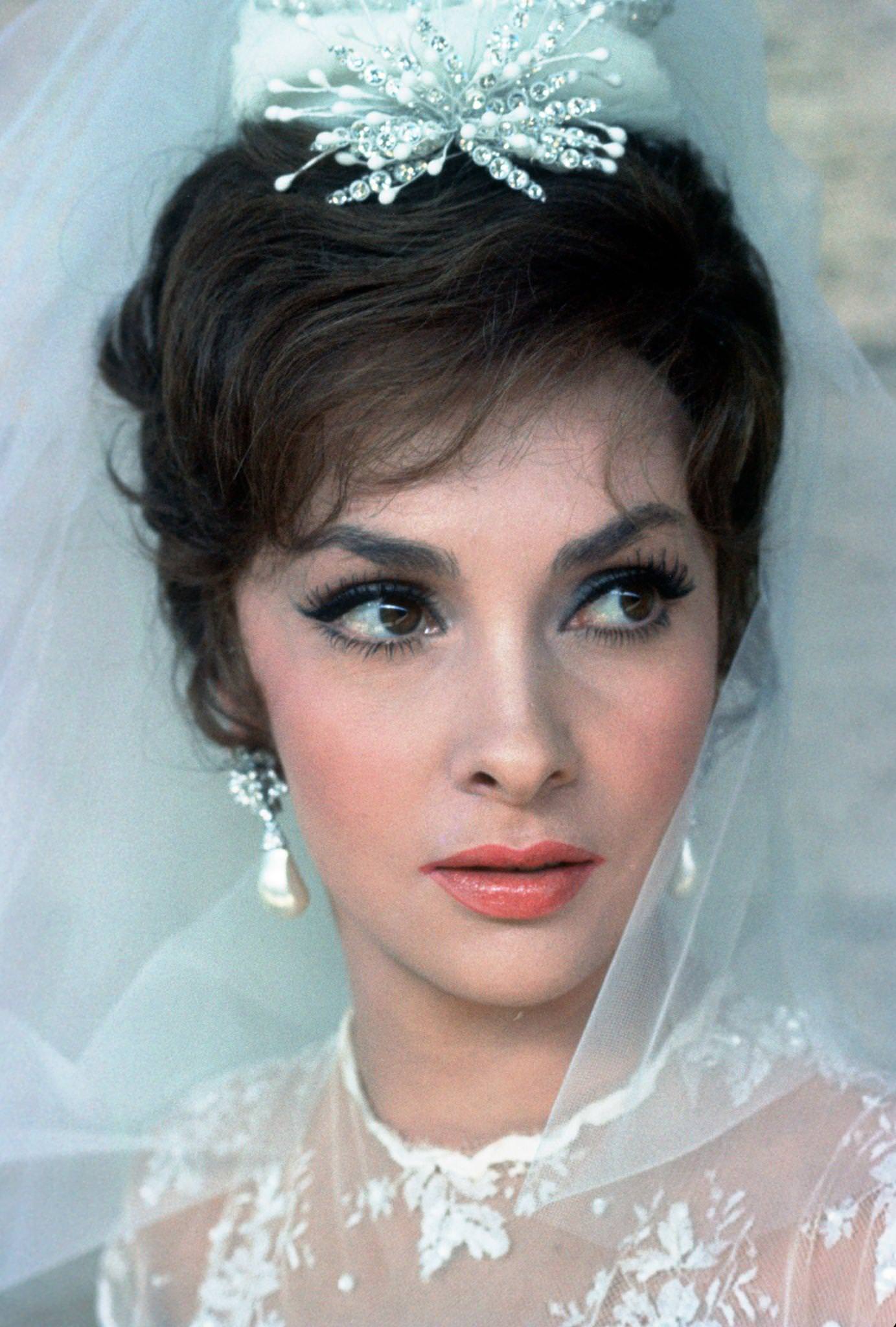 #99 Gina Lollobrigida as a bride for “Come September” in Rome, Italy, 1960.