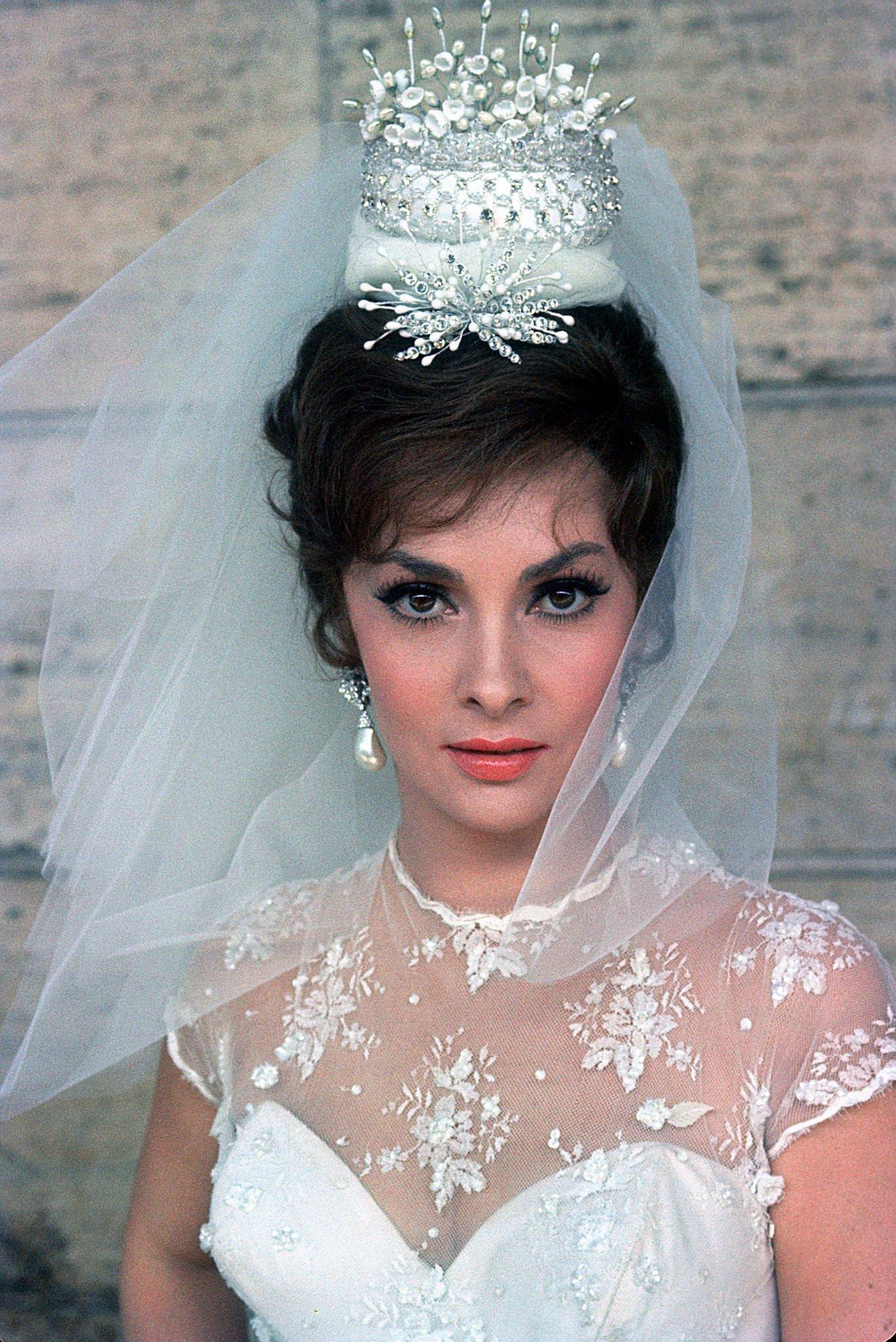 #101 Gina Lollobrigida as a bride for “Come September” in Rome, Italy, 1960.