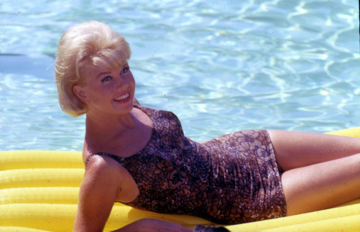 #106 Doris Day poses for a portrait while filming “A Touch of Mink” in Los Angeles, California, 1961.
