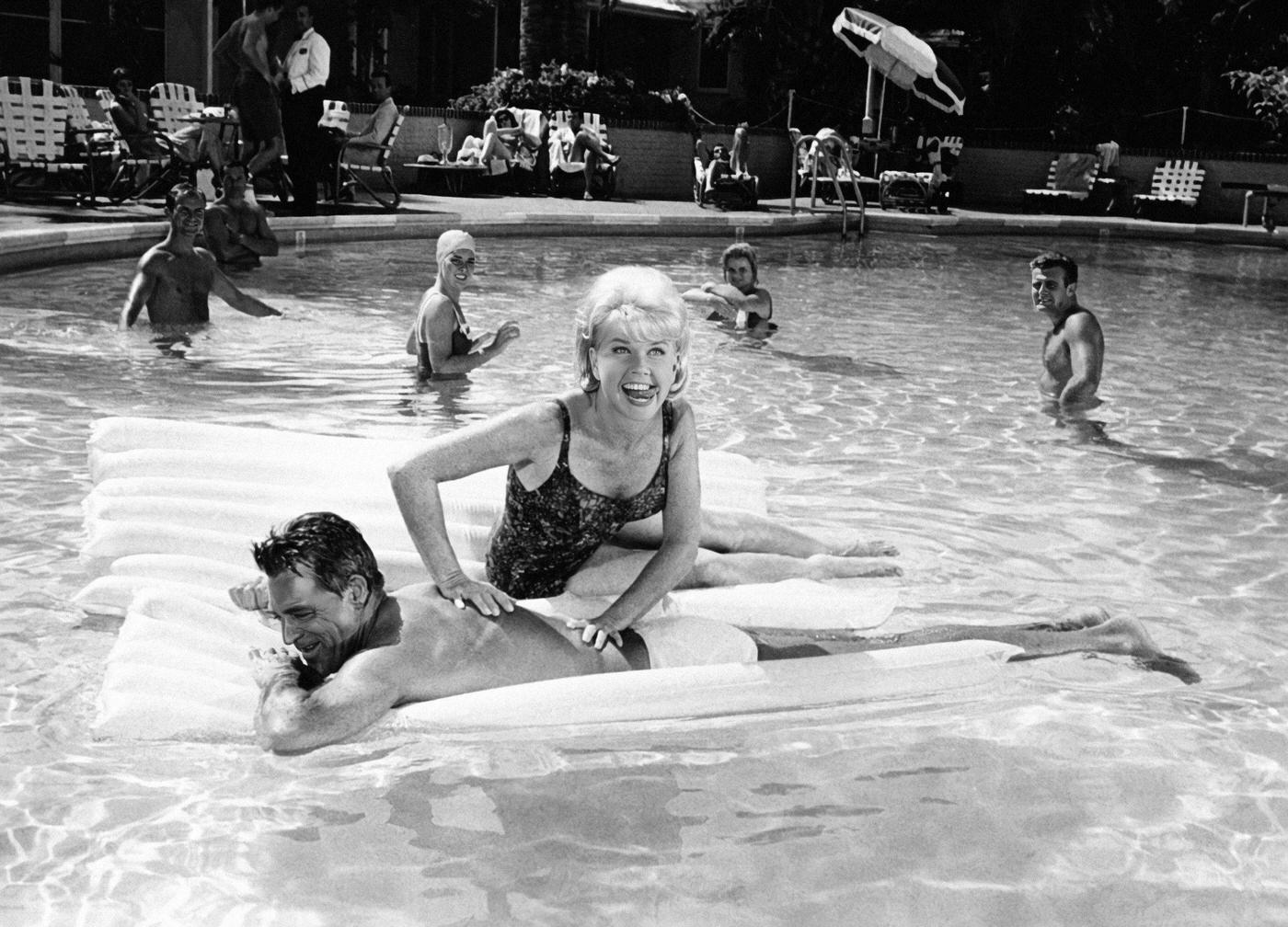 #10 Doris Day and Cary Grant in the Pool While Filming “A Touch of Mink,” Los Angeles, 1961