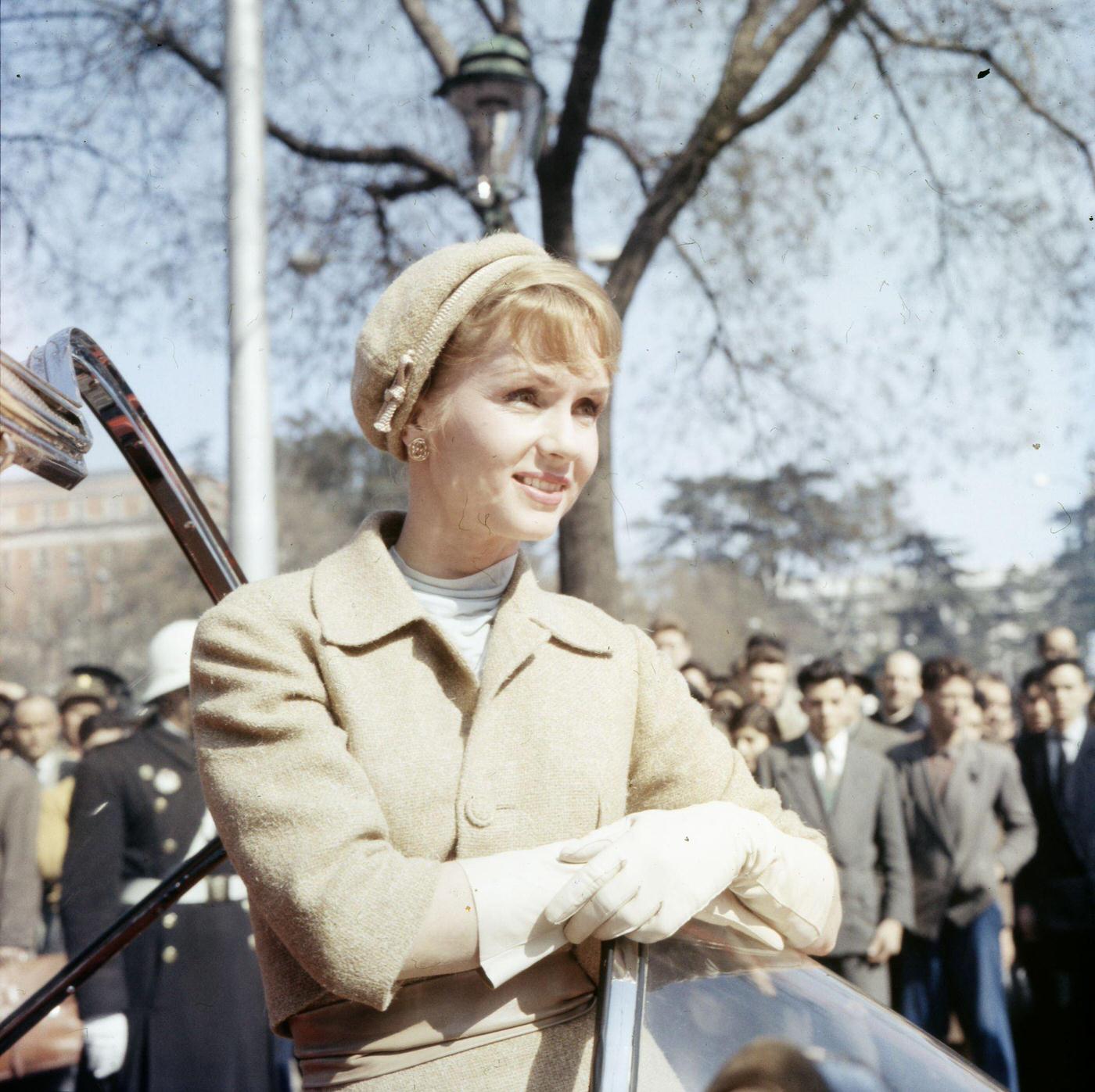 #55 Debbie Reynolds entering a car while filming ‘It Started With A Kiss,’ Madrid, Spain, 1958