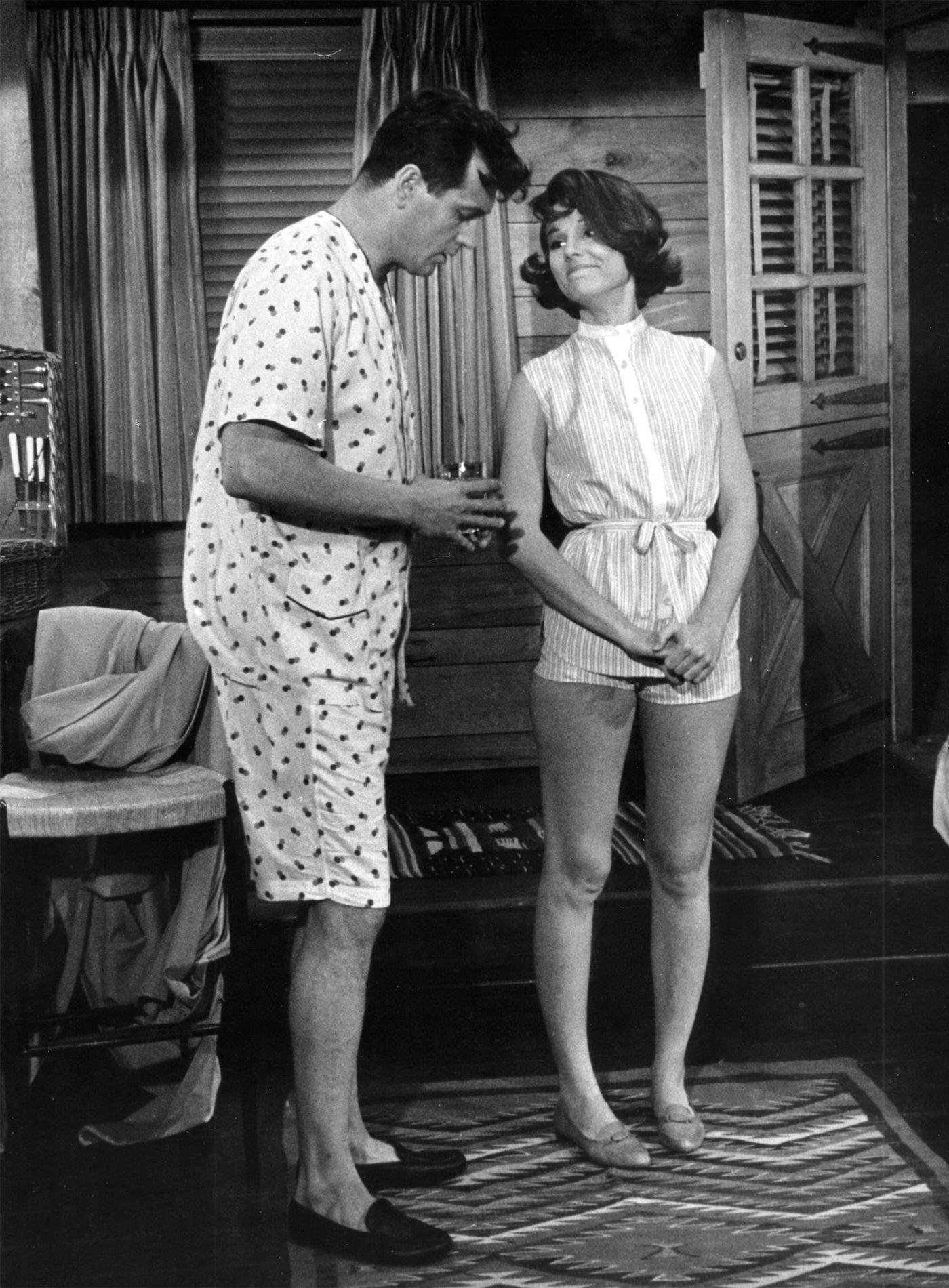 #56 Rock Hudson and Paula Prentiss in pajama, filming “Man’s Favorite Sport?,” Los Angeles, California, 1963