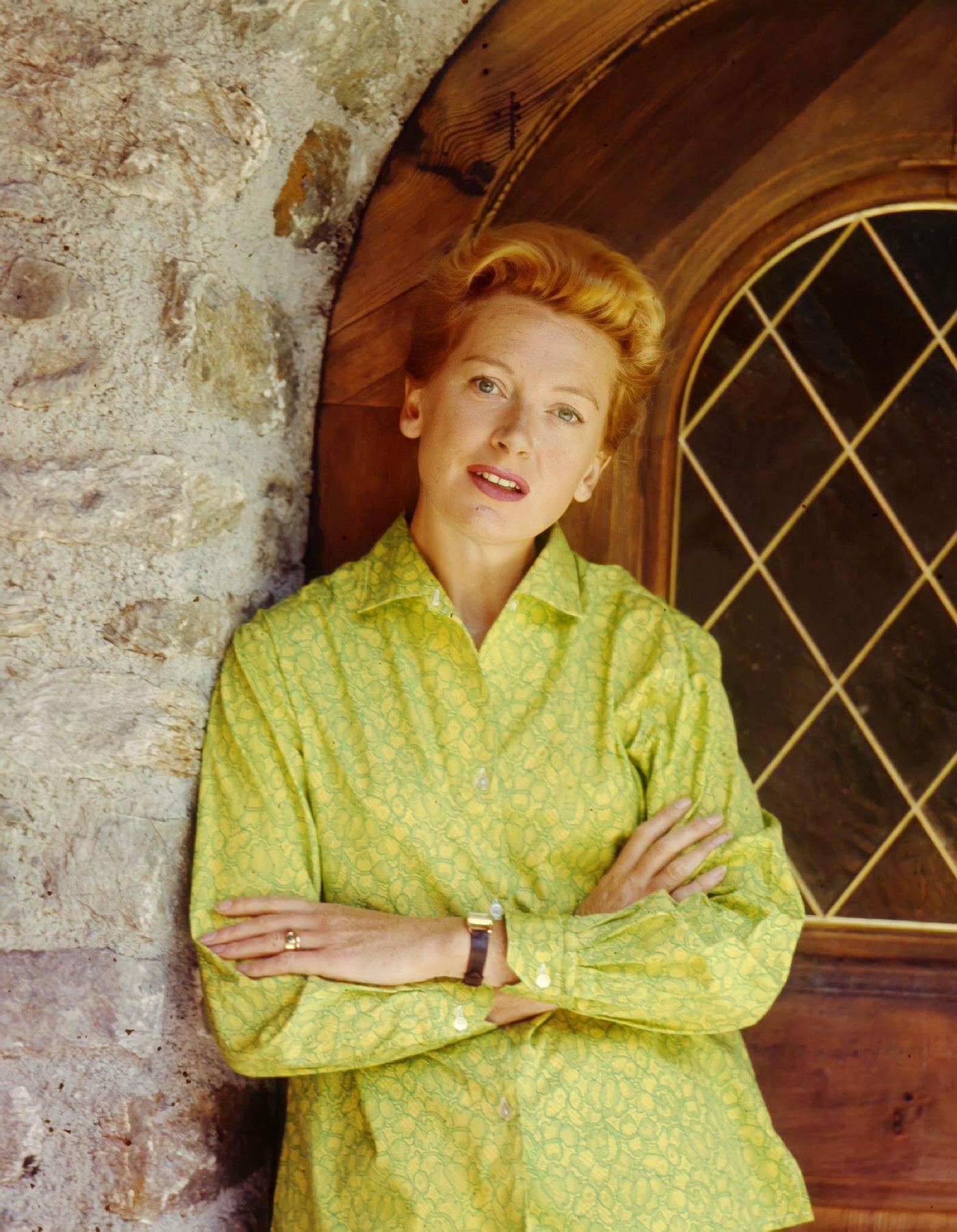 #74 Actress Deborah Kerr poses for a portrait outside her residence in Los Angeles, California, 1956.