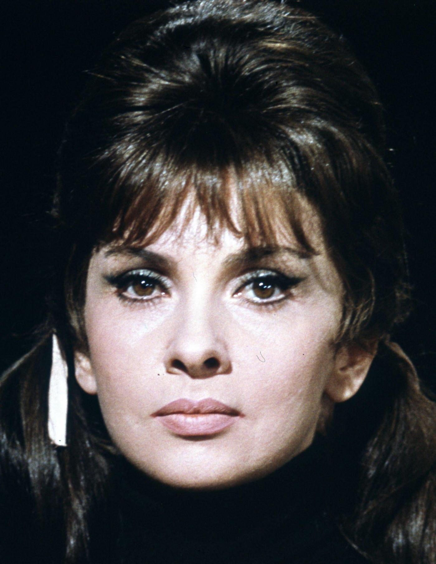 #76 Actress Gina Lollobrigida poses for a portrait on the set of “Solomon and Sheba” in Madrid, Spain, 1958.