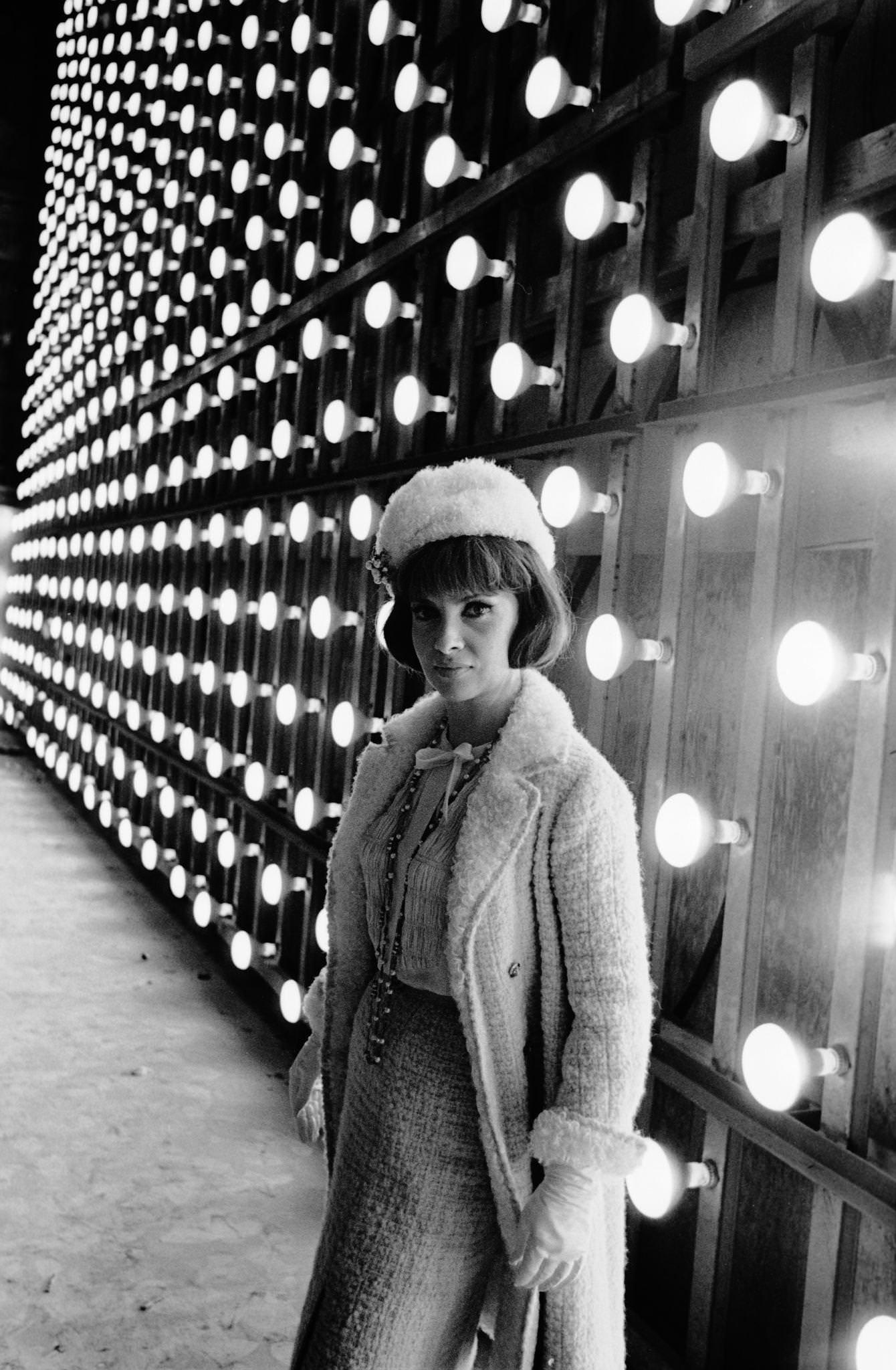 #93 Gina Lollobrigida posing behind the set of “Come September” in Italy, 1960.