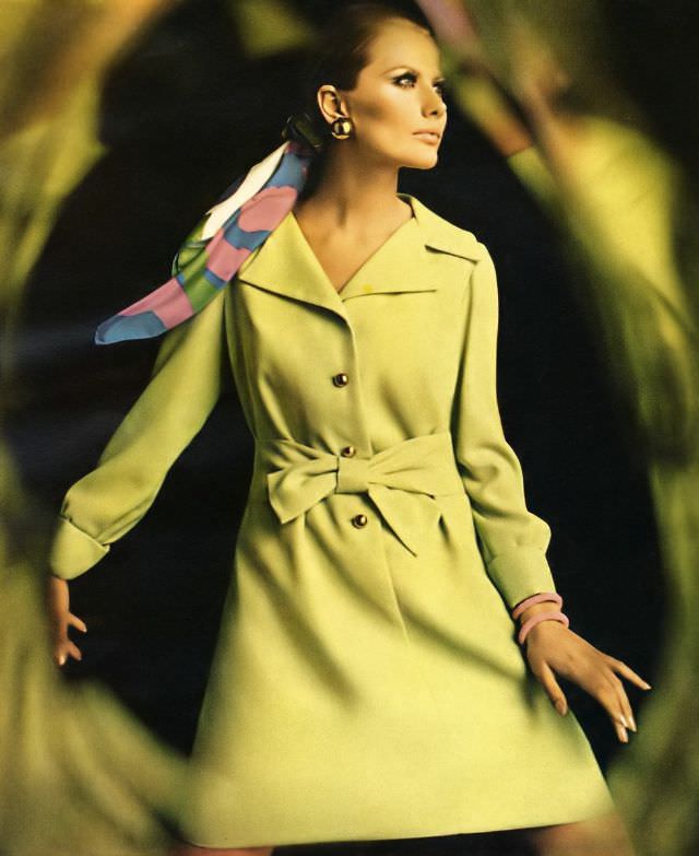 #22 Maud Adams in Fortrel Crêpe Shirtdress with Self-Sash and Glitzy Buttons by Miss Couture, Vogue, January 1968