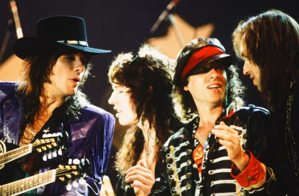 #19 Richie Sambora, Tom Keifer, Klaus Meine and Gorky Park’s Nikolai Noskov share an onstage moment during the end-of-show all-star jam.
