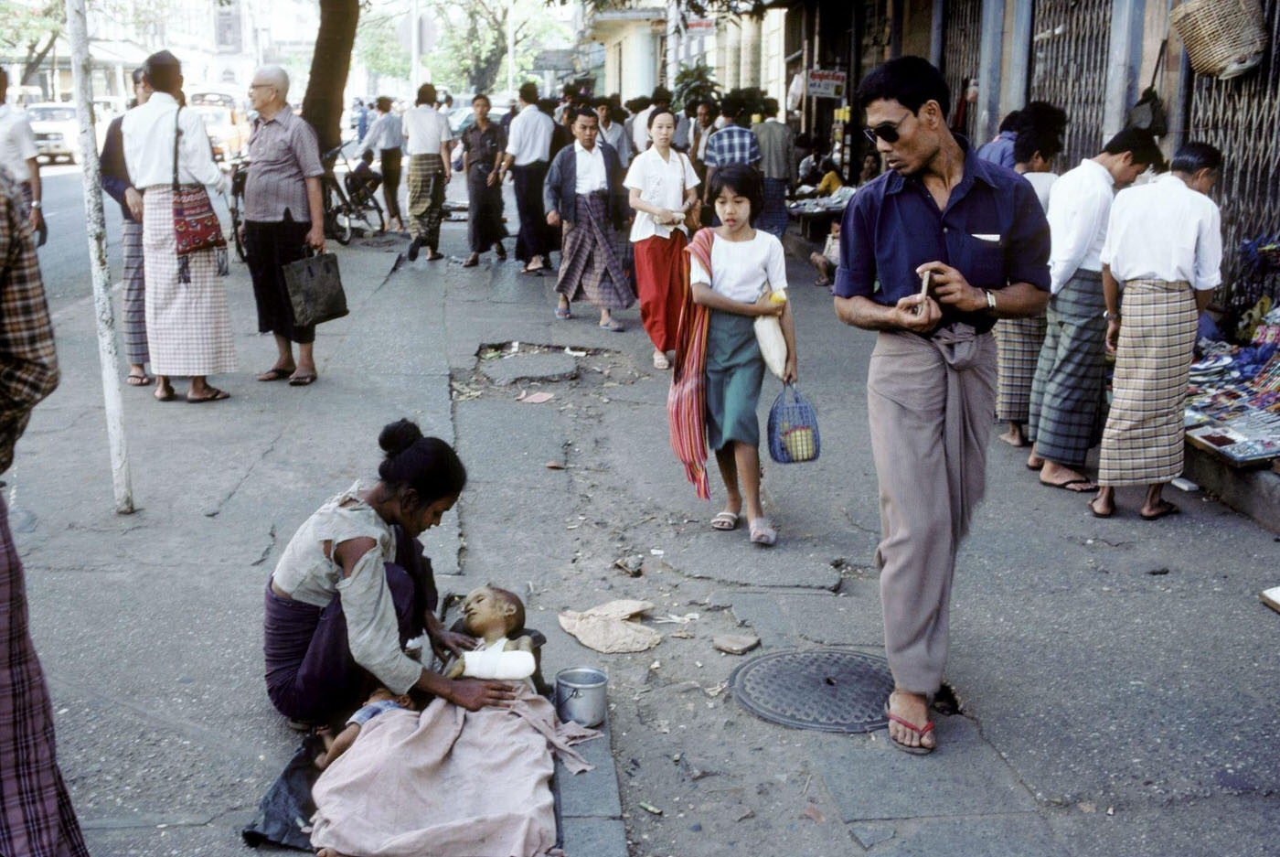 #38 Mother with Sick Child Begs on the Streets of Rangoon, Burma, 1985