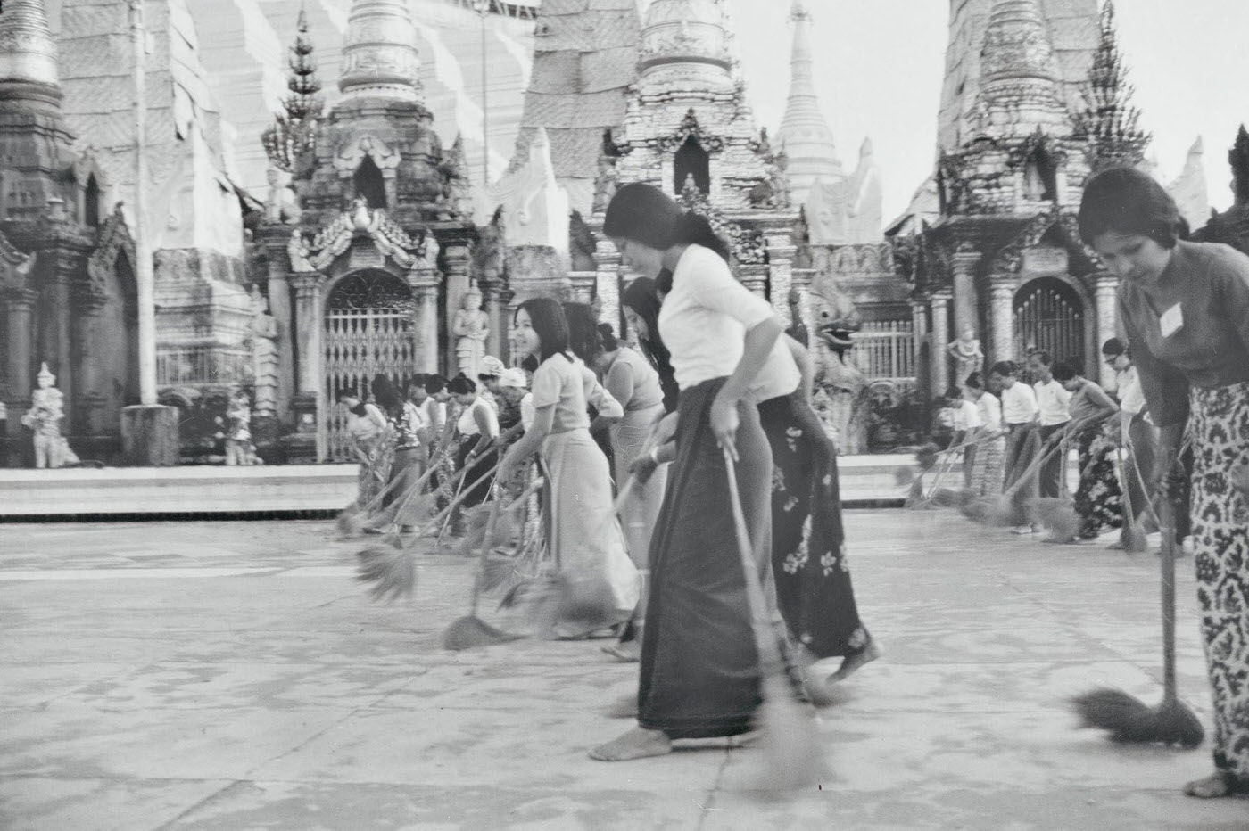 #7 Pious Burmese Women Clean the Marble-Covered Grounds of the Schwedagon Temple in Rangoon