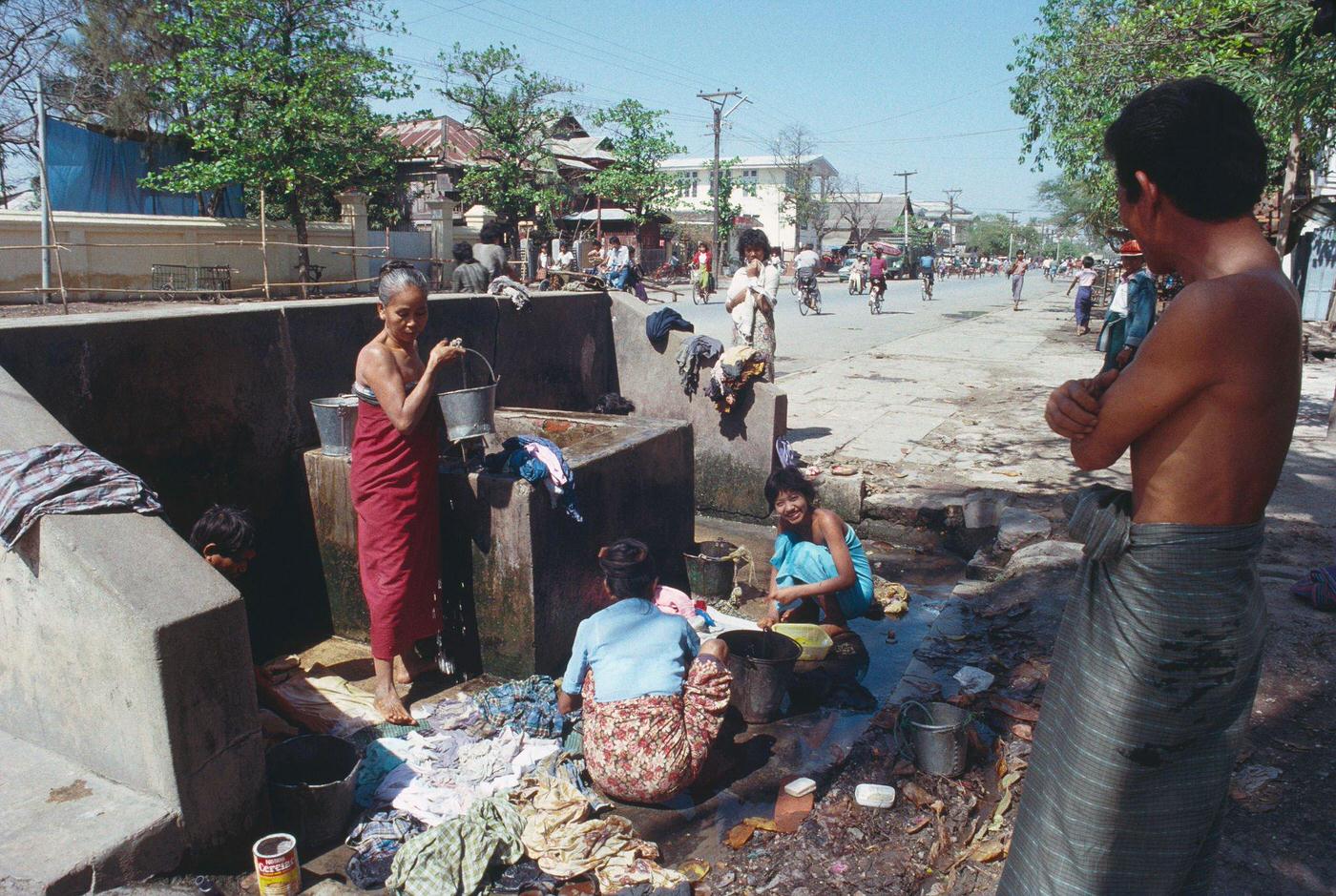 #70 Public washing area in Mandalay, Burma, 1988.