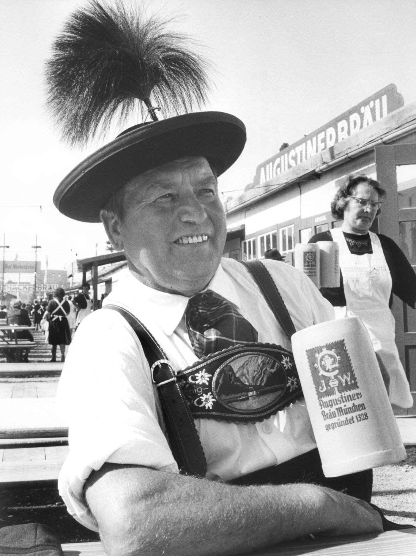 #30 Bavarian man with beer tankard at Oktoberfest, 1964.