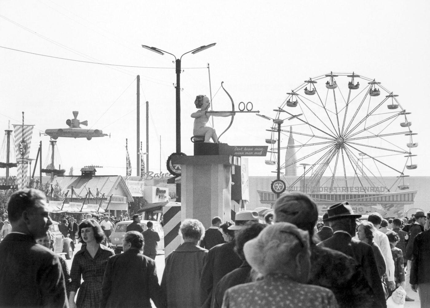 #32 Visitors at Oktoberfest Wiesn, 1965.