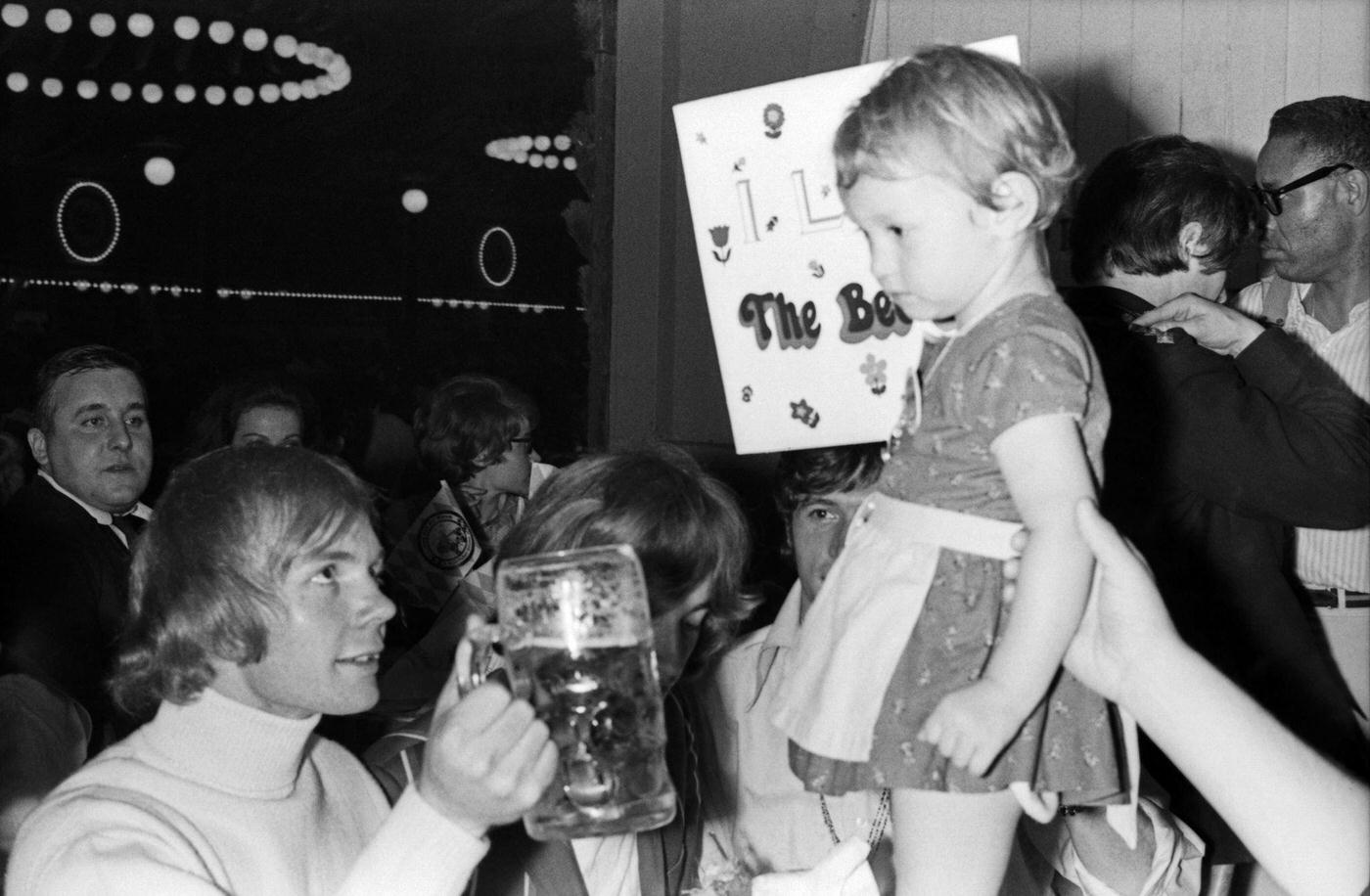 #46 The Bee Gees with fans at Munich Oktoberfest. 1960s.