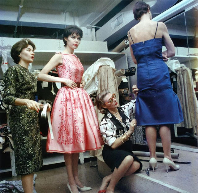 #5 Pauline Trigere Fitting a Dress on a Model with Sue Ellen Gigli Trying on a Pink Dress, 1962