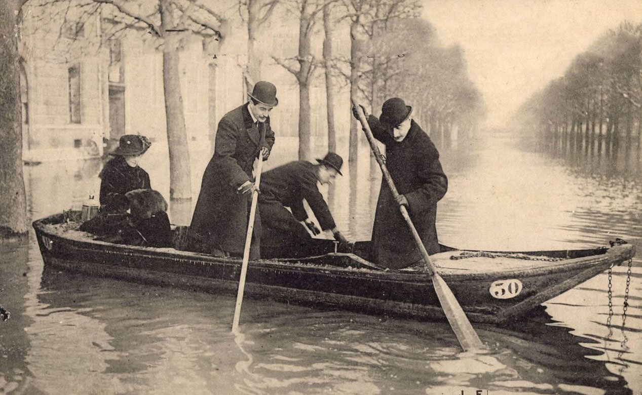 #125 Paris, Jan-Feb 1910 – Aviator Lesseps and Baroness Delagrange during the floods.