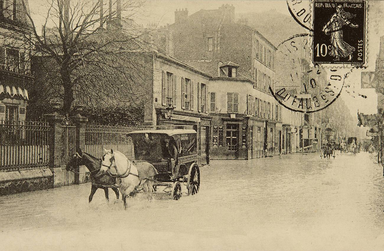 #50 Photography – View of Paris, Street Lourmel during 1910 flood, baker in cart.