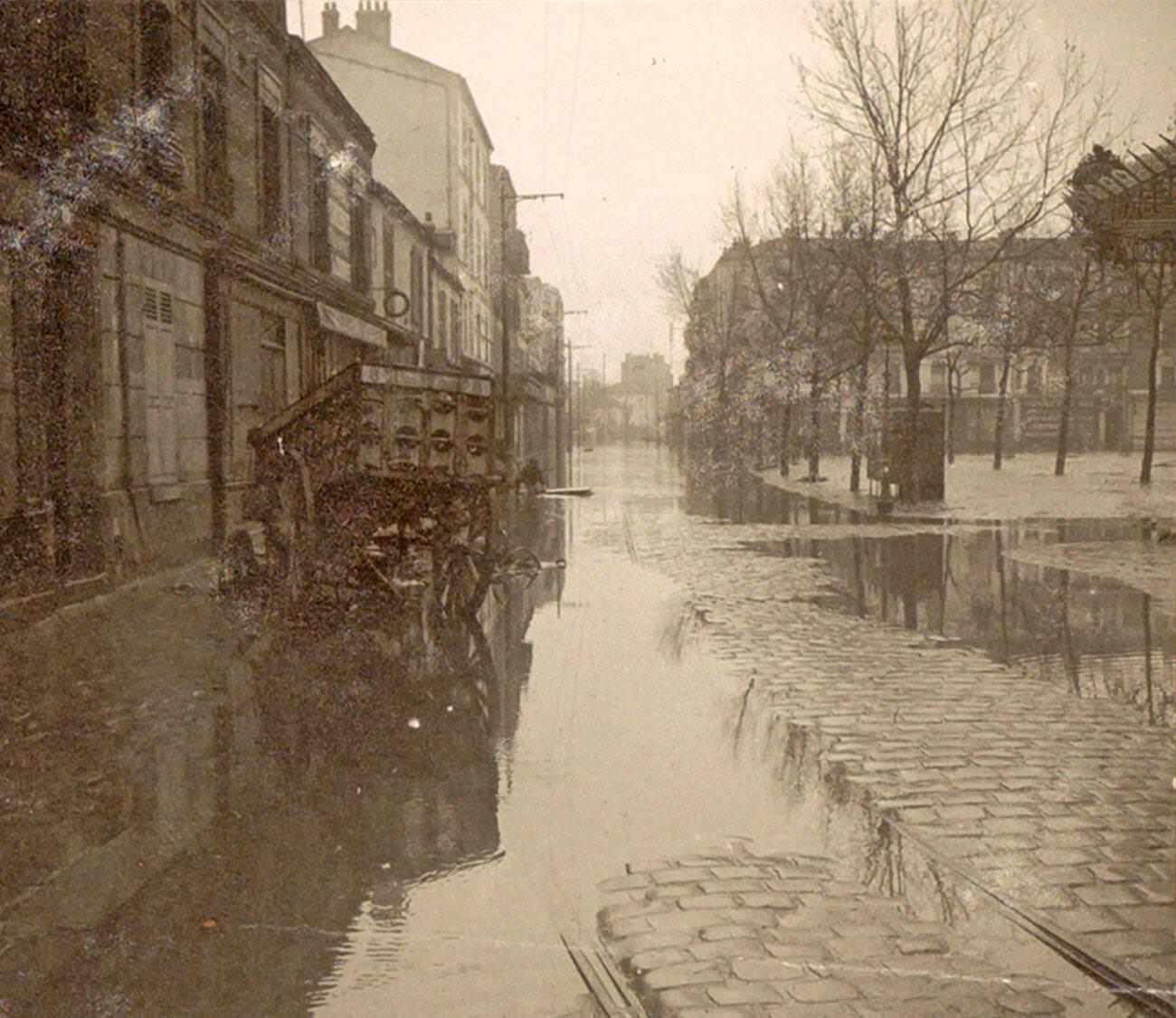 #54 Car in flooded street during Paris flood, 1910.