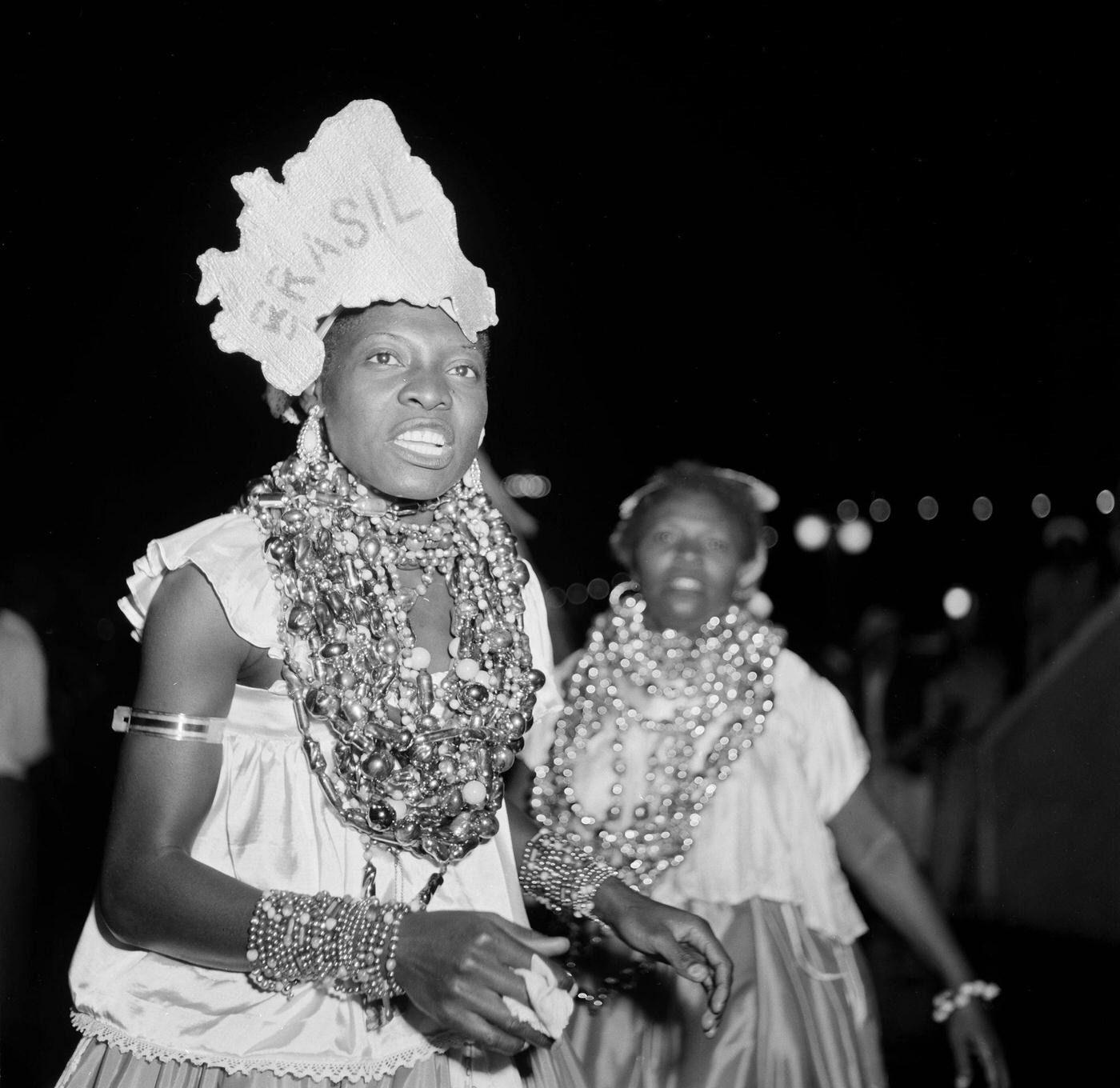#79 Carnival parade revelers march in Rio de Janeiro’s Carnival. 1953