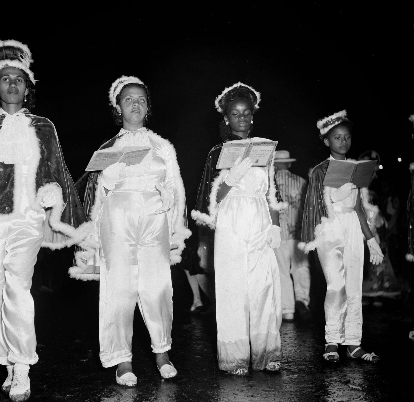#84 Carnival parade revelers march in Rio de Janeiro’s Carnival. 1953