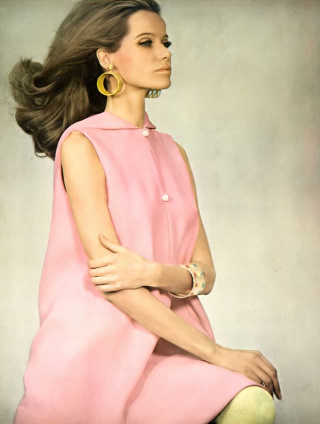 #7 Veruschka in a pink crêpe dress with a hooded collar, Vogue, 1967