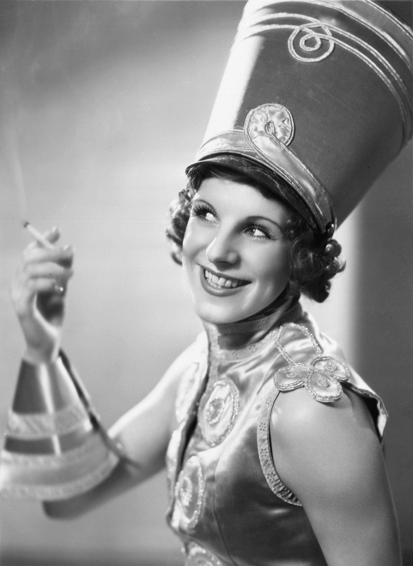 #46 Dancer Iris Kirkwhite dressed as a soldier wearing a shako, 1933