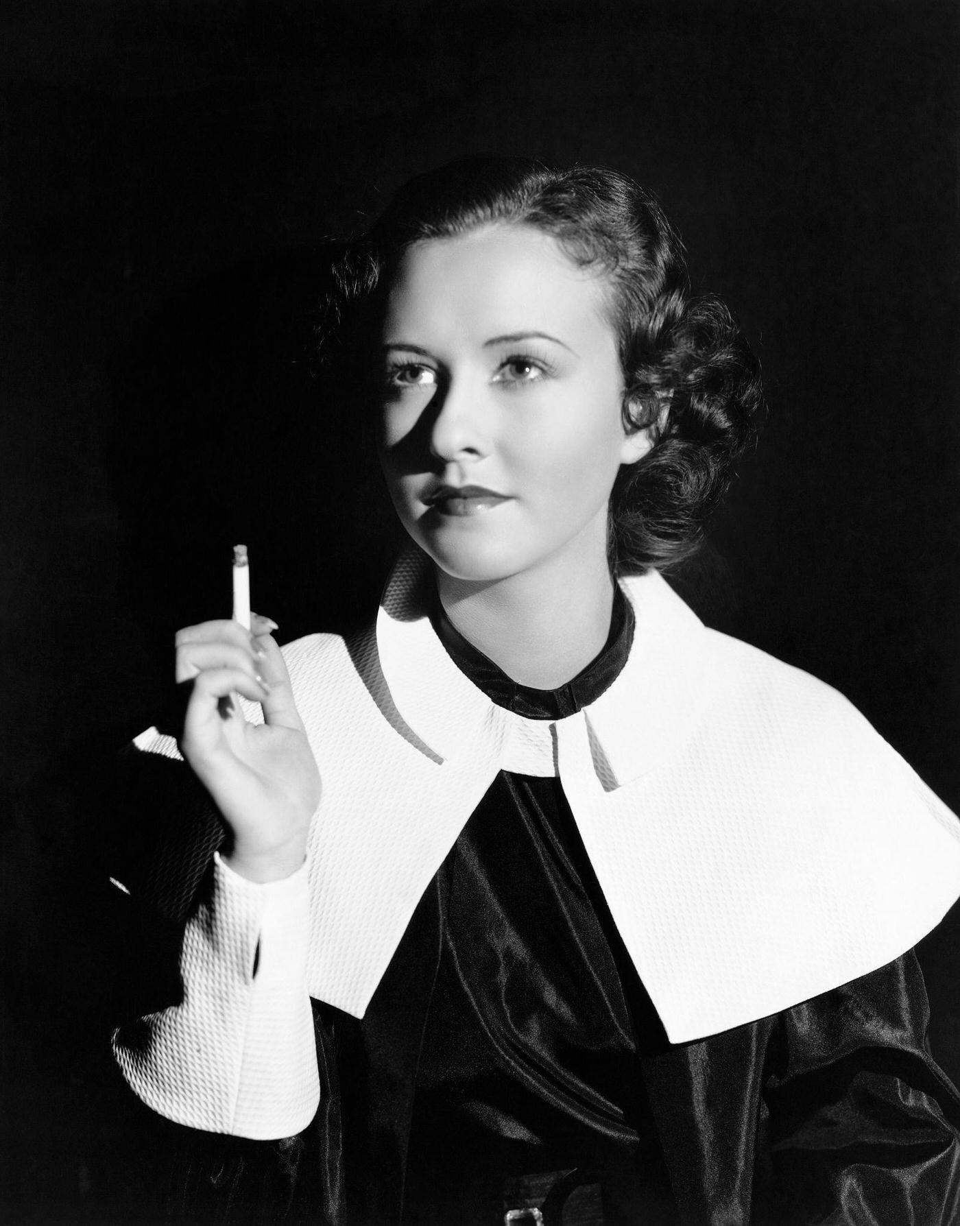 #49 Actress Margaret Lindsay Smoking Cigarette