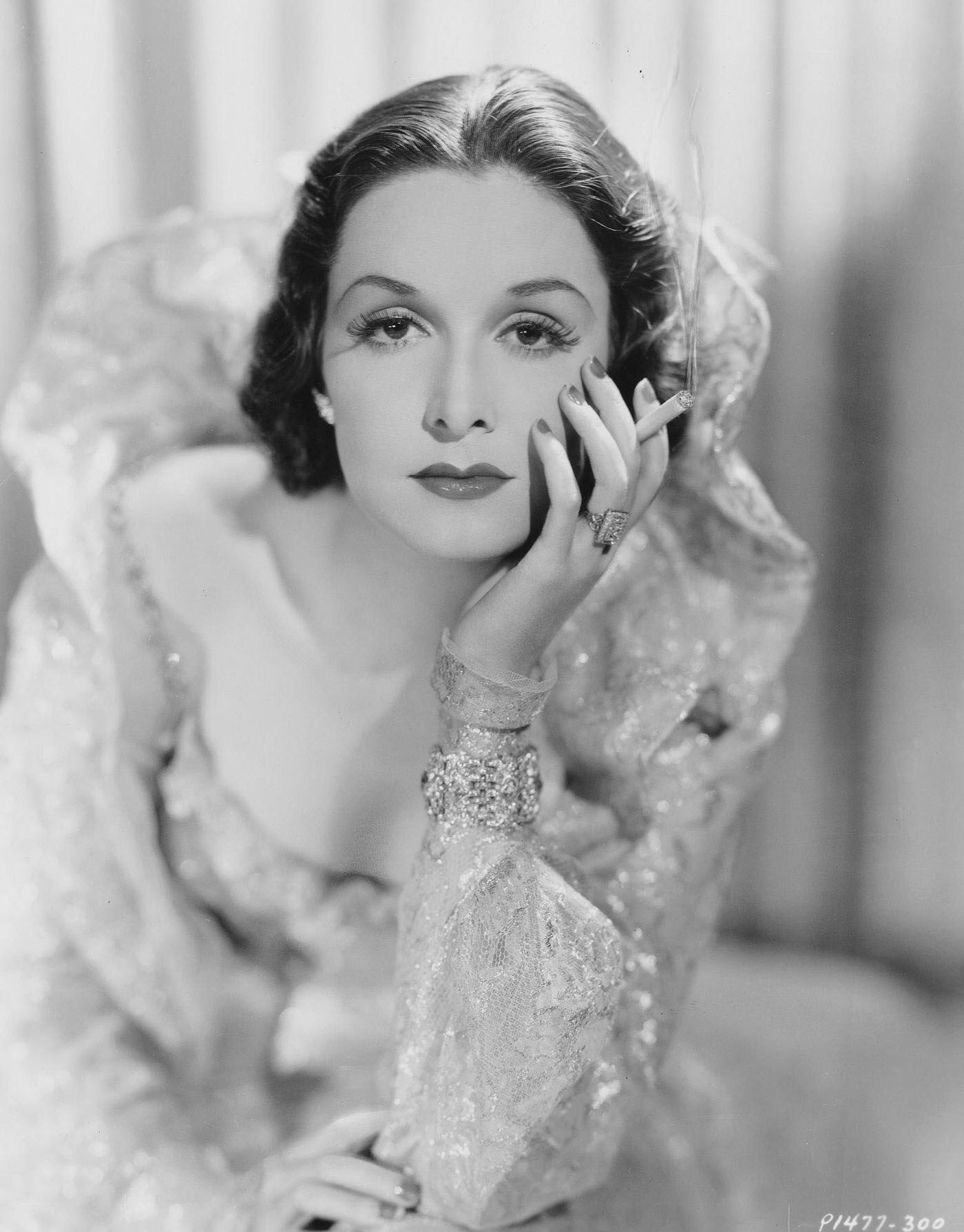 #65 Actress Gail Patrick Holding Cigarette