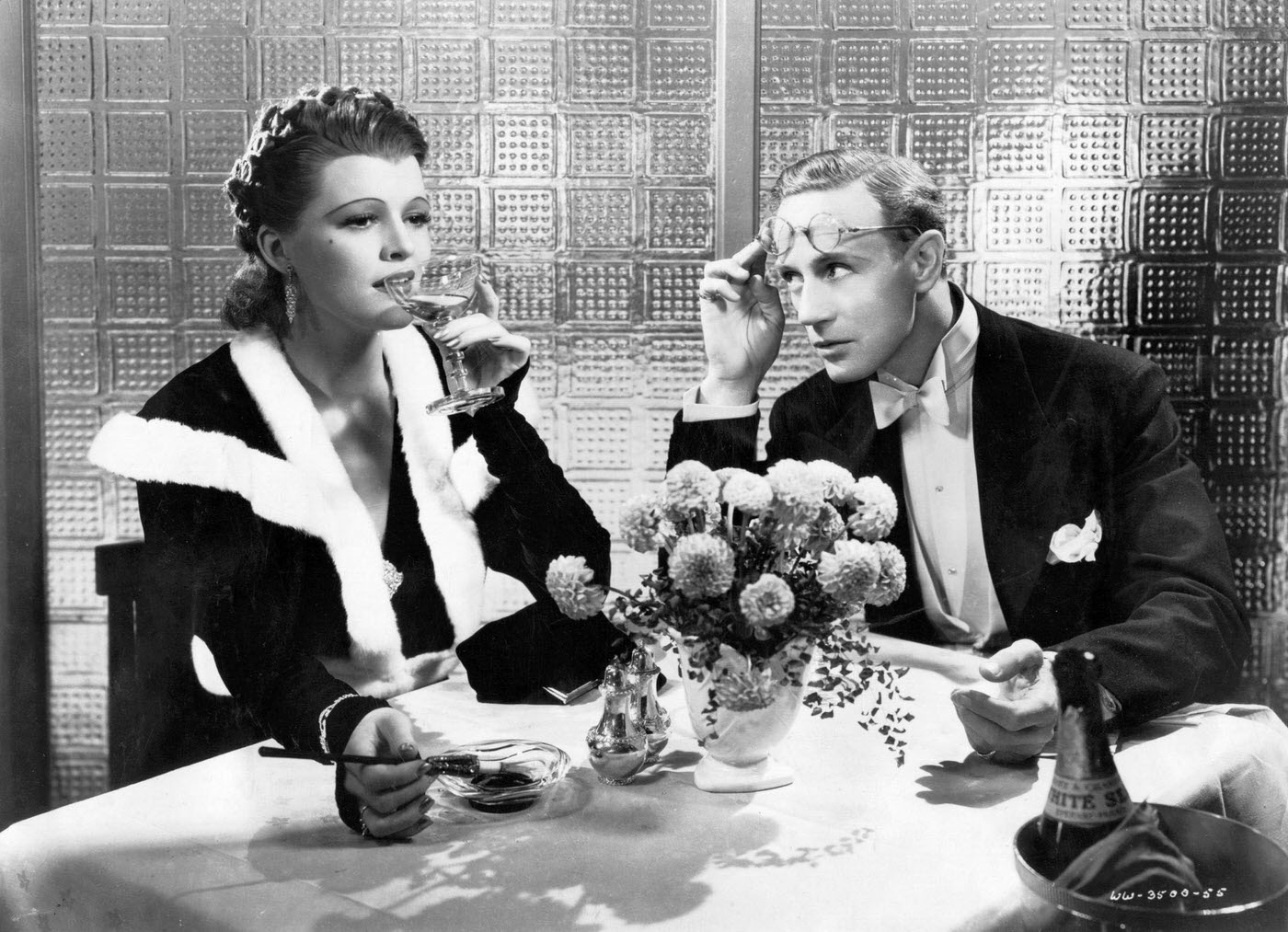 #75 Leslie Howard and Marla Shelton talk in a scene from ‘Stand In’, 1937