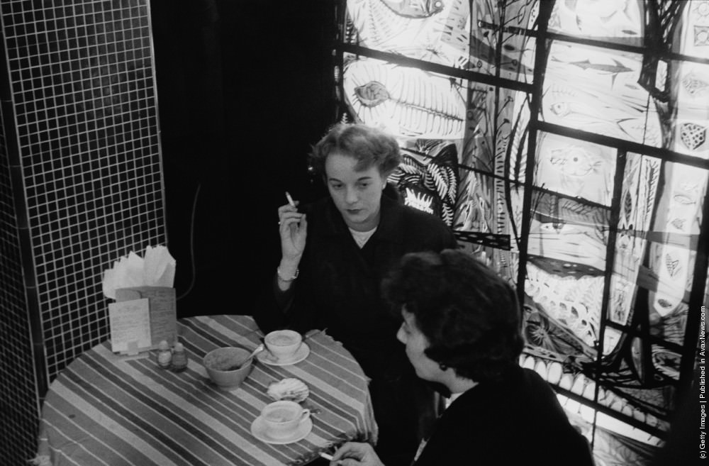#17 Two women chatting at a coffee bar in London. 4th November 1955.