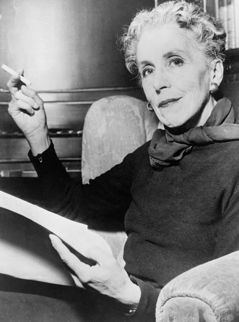 #36 Danish writer Isak Dinesen (Karen Blixen) smoking a cigarette, undated, assumed 1950s.