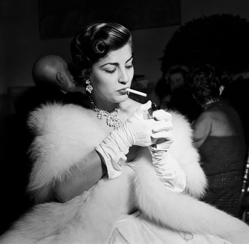 #45 Greek actress Irene Papa smoking a cigarette, 1952.