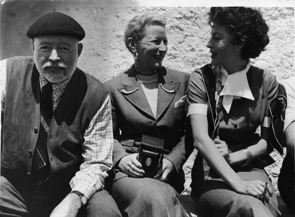#66 Ernest Hemingway with his wife Mary Welsh Hemingway and actress Ava Gardner in the mid to late 1950s.