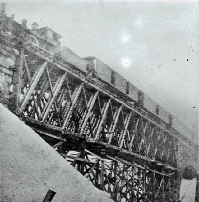 The Lake Shore &; Michigan Southern Howe Truss Ashtabula River Bridge. Noting the cribbing below. A temporary construct after the 1876 collapse, before the concrete arch bridge was built