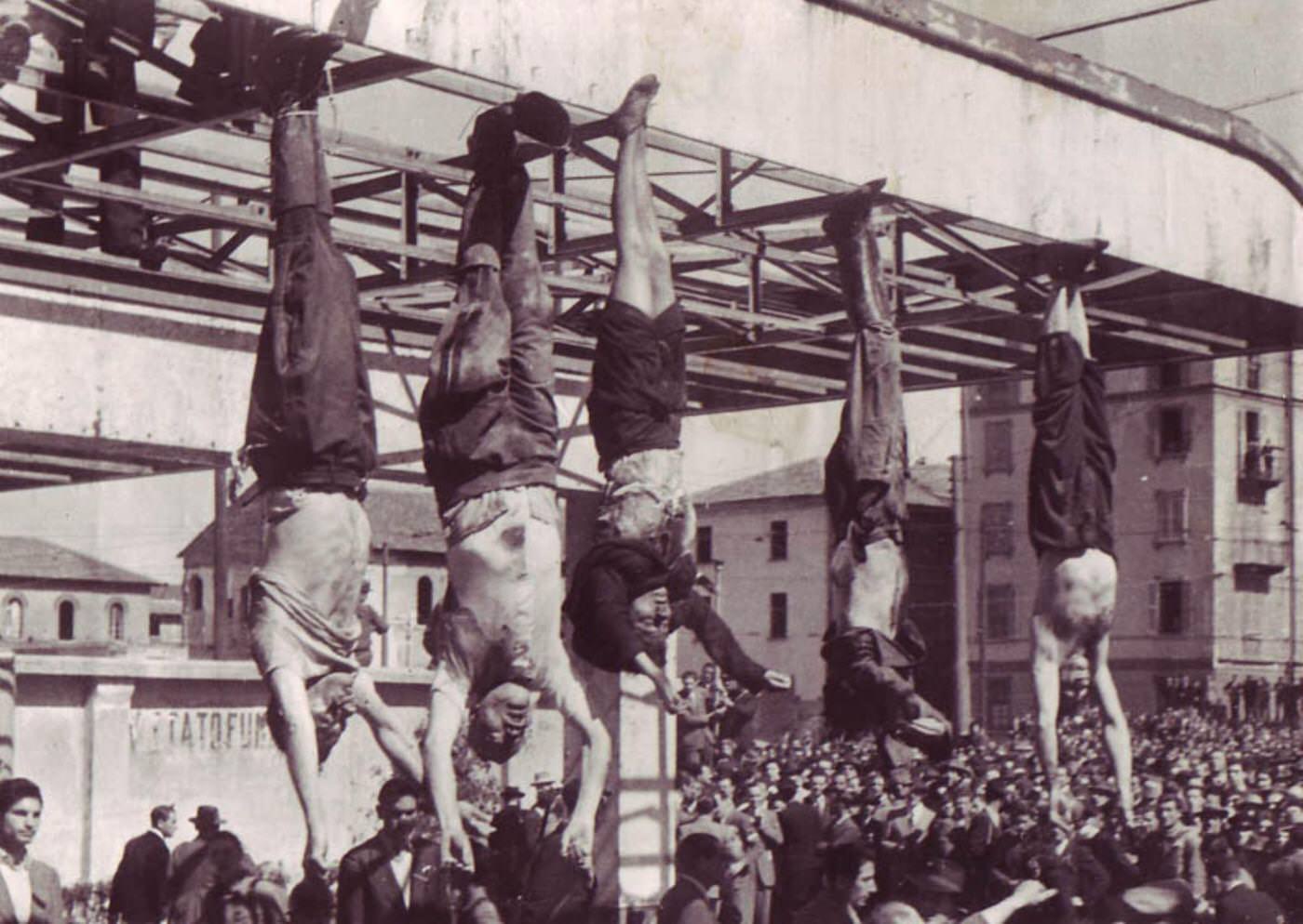 #11 Benito Mussolini and Clara Petacci Executed in Public Square, 1945